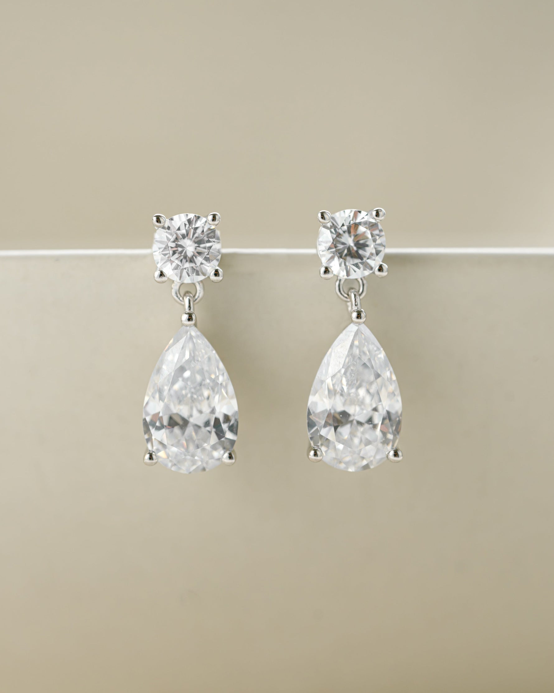 Sterling silver minimalist earrings featuring diamond dangling earrings