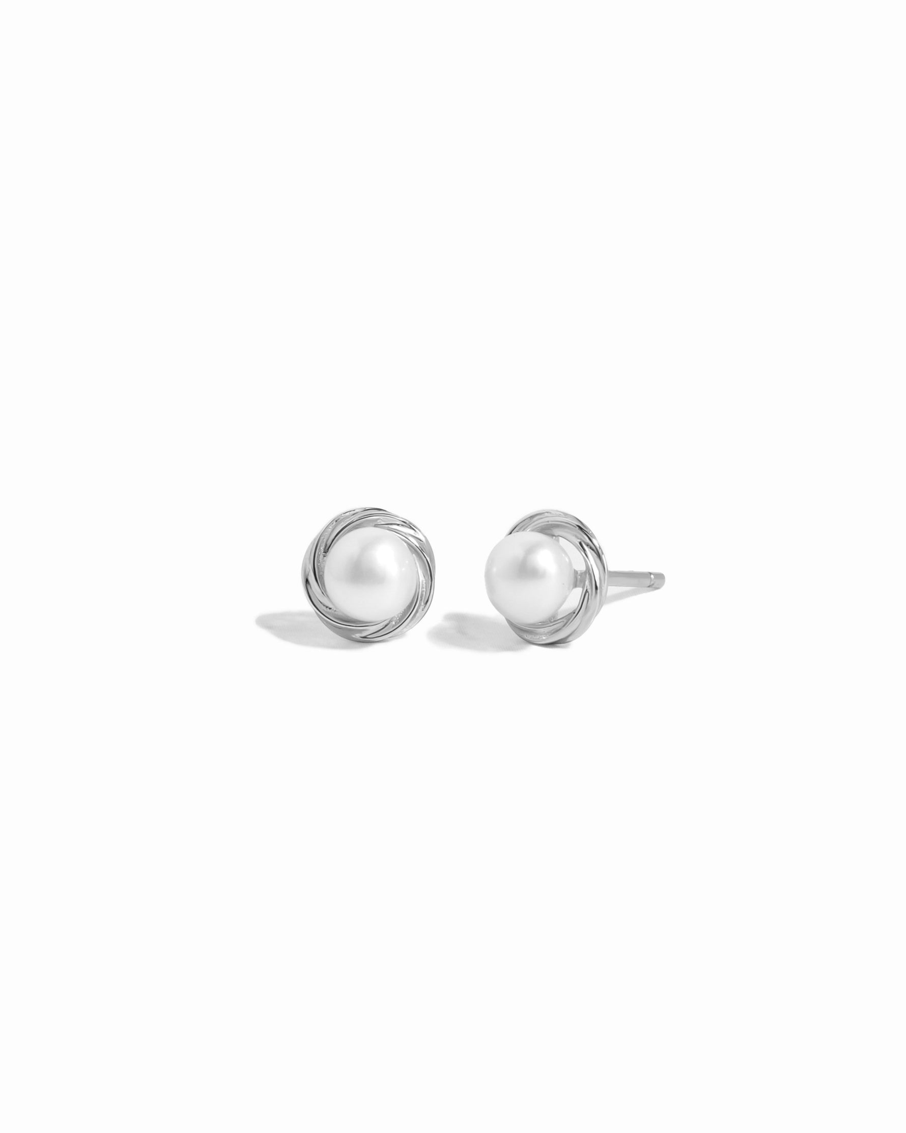 Closeup image of freshwater pearl earrings in sterling silver