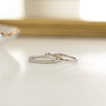 Closeup image of silver diamond ring set