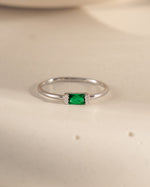 sterling silver cz ring with emerald stone and white cz diamonds