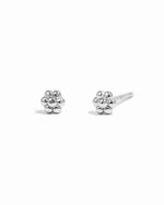 Sterling silver tiny flower studs.