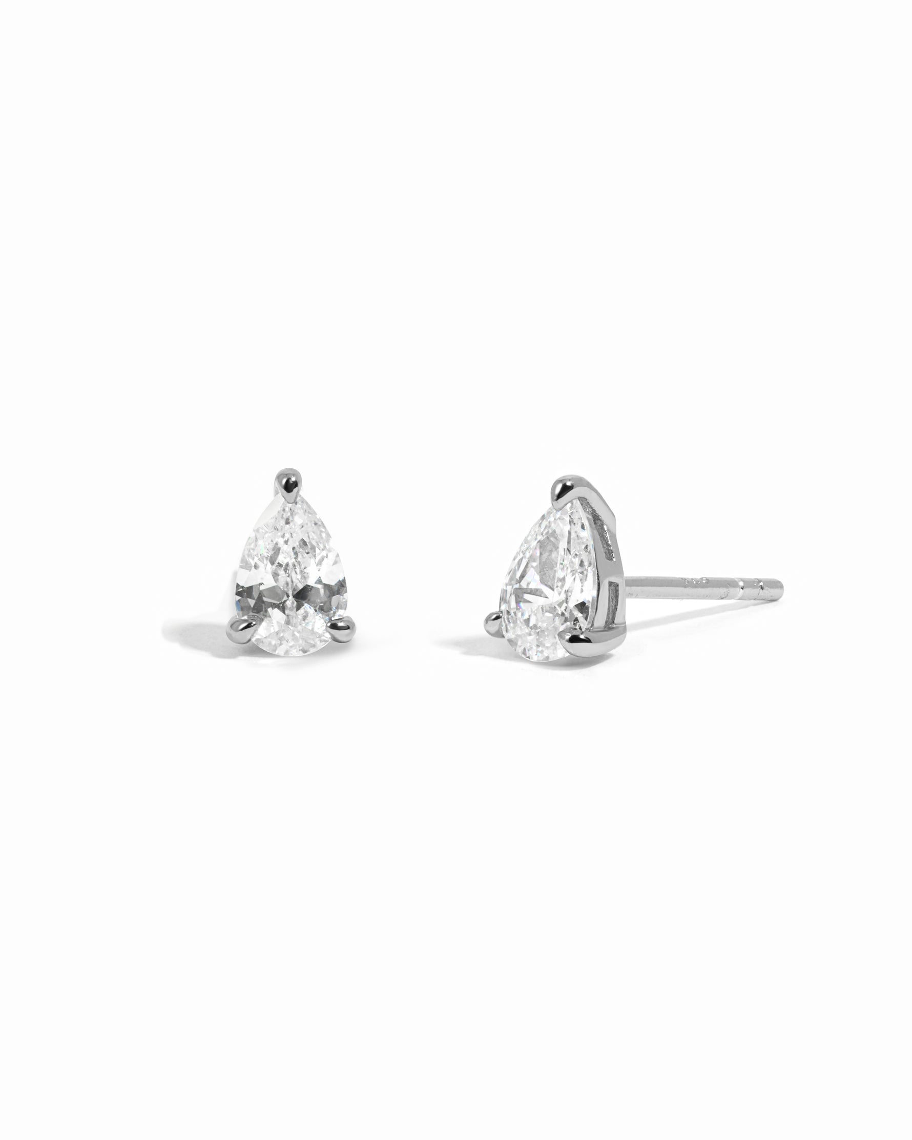 Sterling silver cubic zirconia stud earrings on a white background