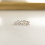 Closeup image of silver eternity ring