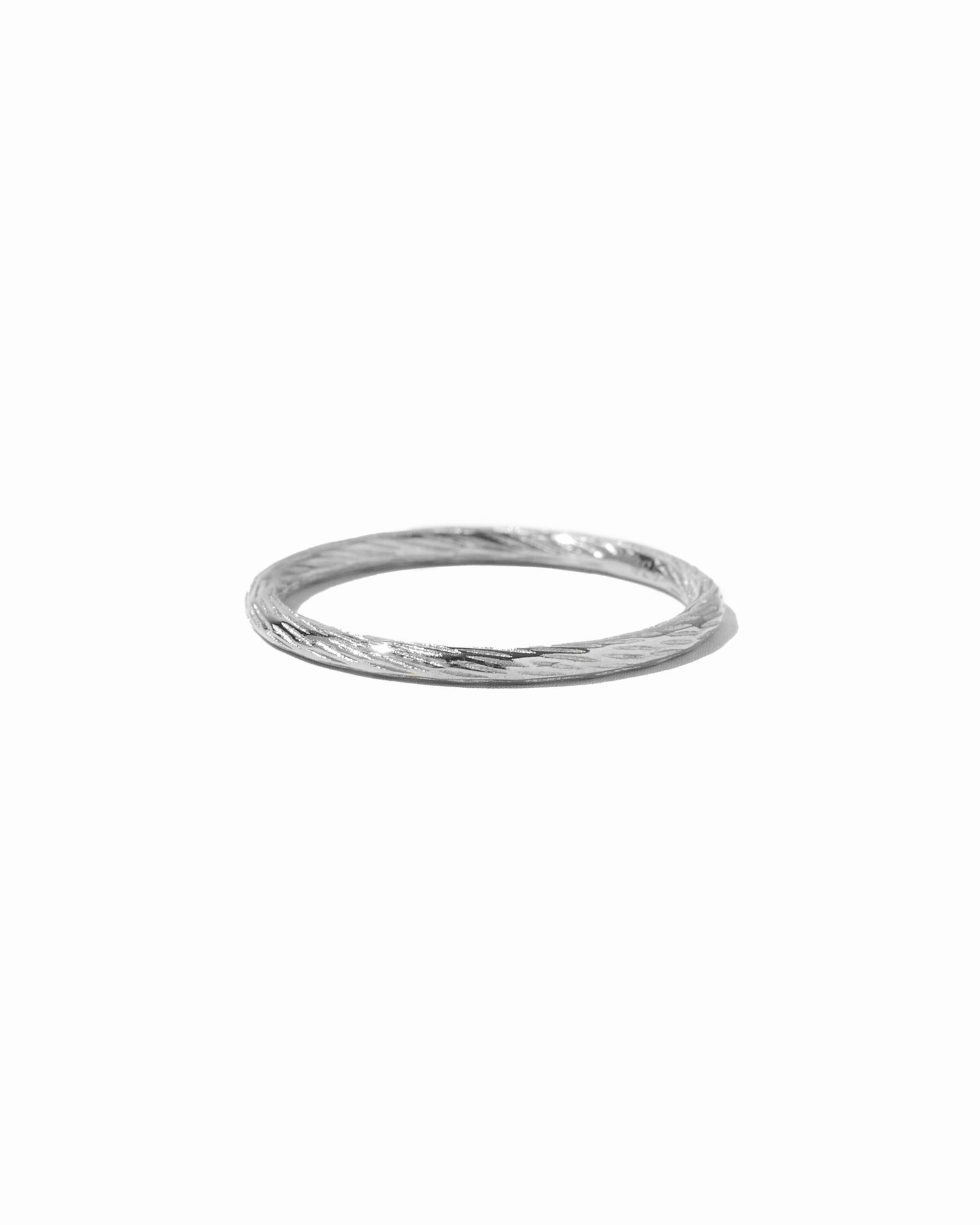 Sami Jewels textured stacking band ring featuring a hammered finish, perfect for layered jewelry looks.