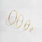 image showcasing various sizes available for the endless gold hoop earrings
