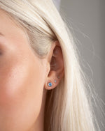 Closeup image of sterling silver stud earrings 
