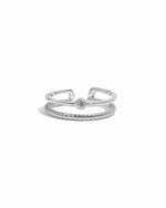 Sterling silver foot jewelry featuring a silver toe ring on a white background