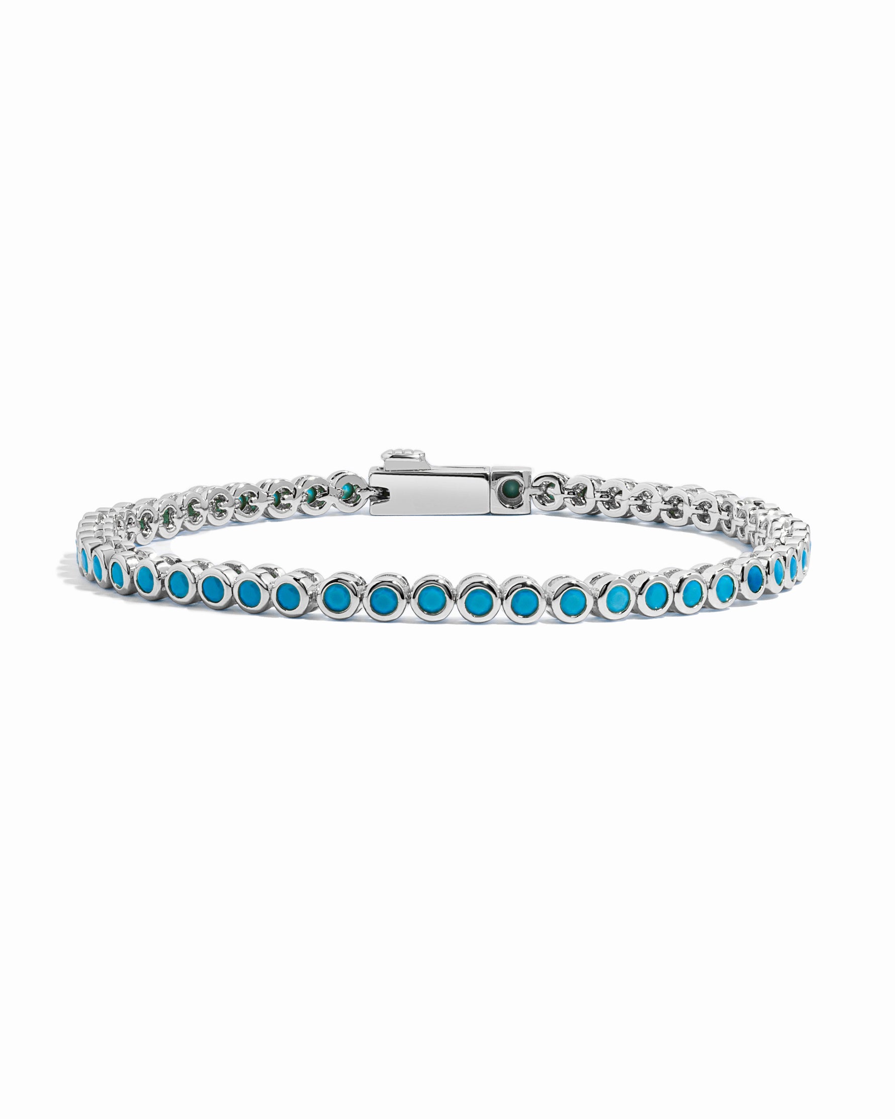 silver tennis bracelet with turquoise bezel set stones
