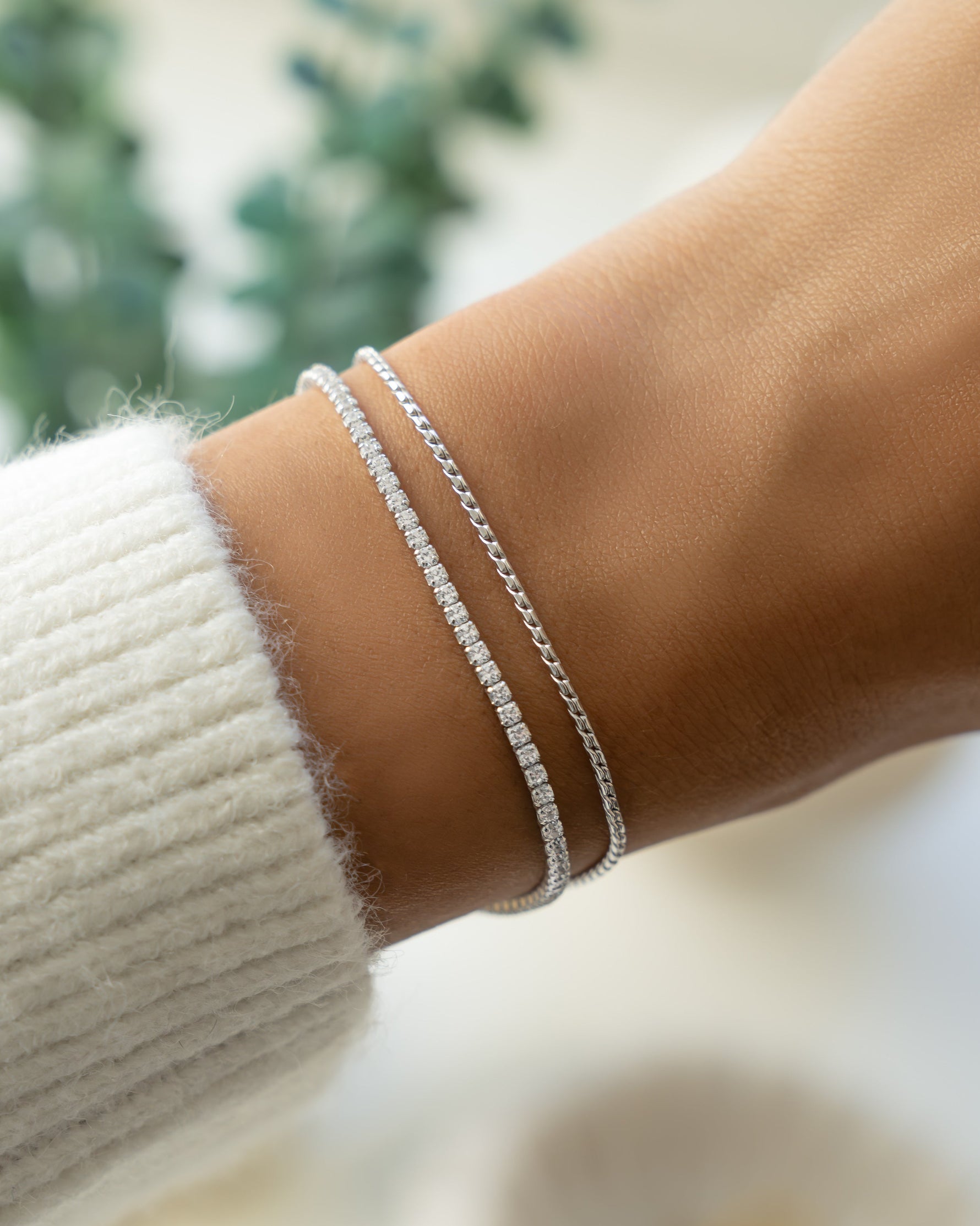 Silver dainty bracelet set on model
