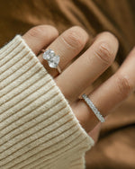 Sterling silver diamond stackable rings featuring an oval engagement ring and a diamond eternity ring
