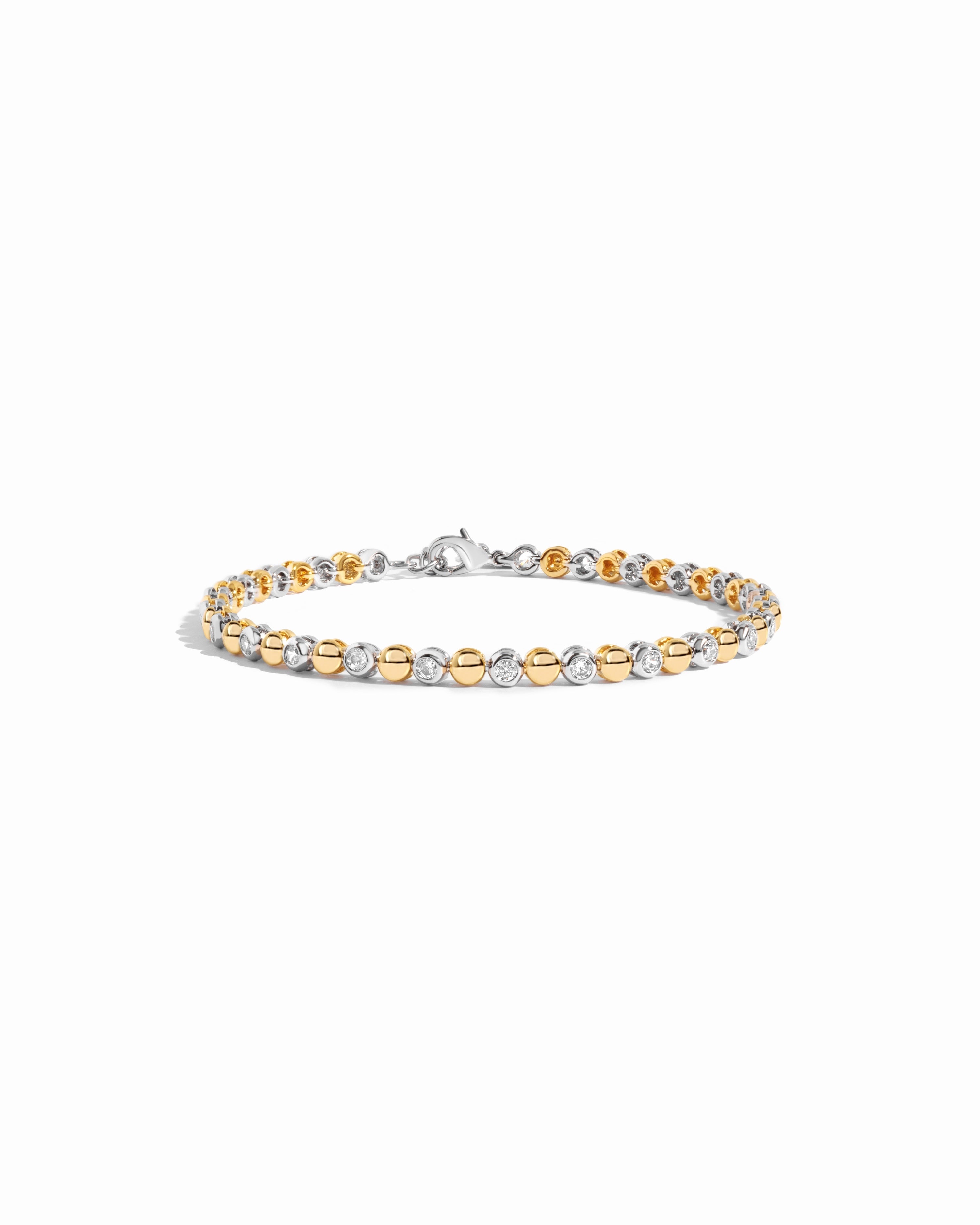Mixed metal bead and bezel tennis bracelet by Sami Jewels featuring two-tone metal design and delicate craftsmanship.