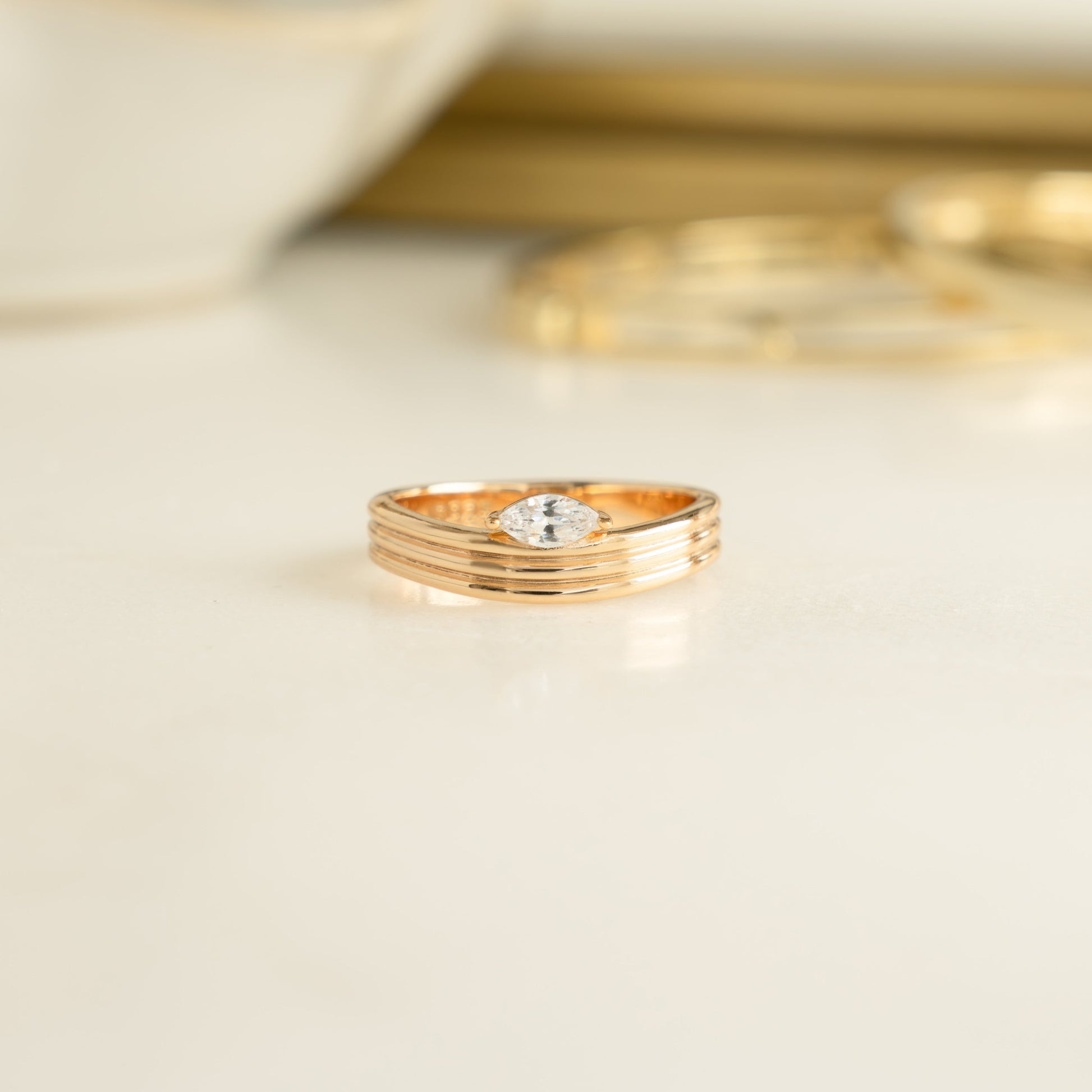 closeup of trendy stackable marquise cut ring