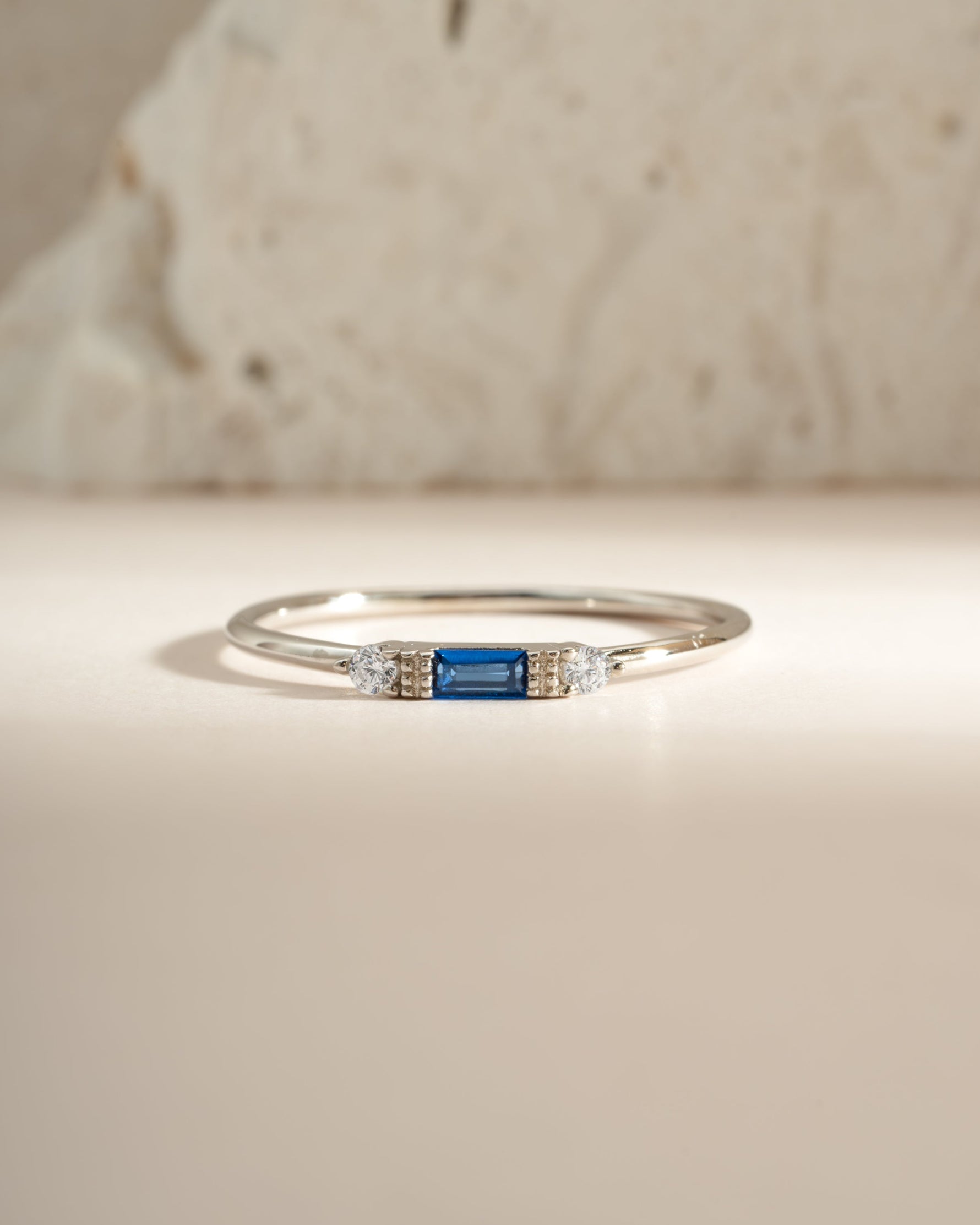 Sterling silver Sapphire Baguette Ring featuring a rectangular blue sapphire gemstone from Sami Jewels.
