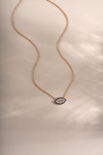 Sapphire Evil Eye Necklace in rose gold from Sami Jewels featuring a blue sapphire evil eye pendant on a delicate chain.