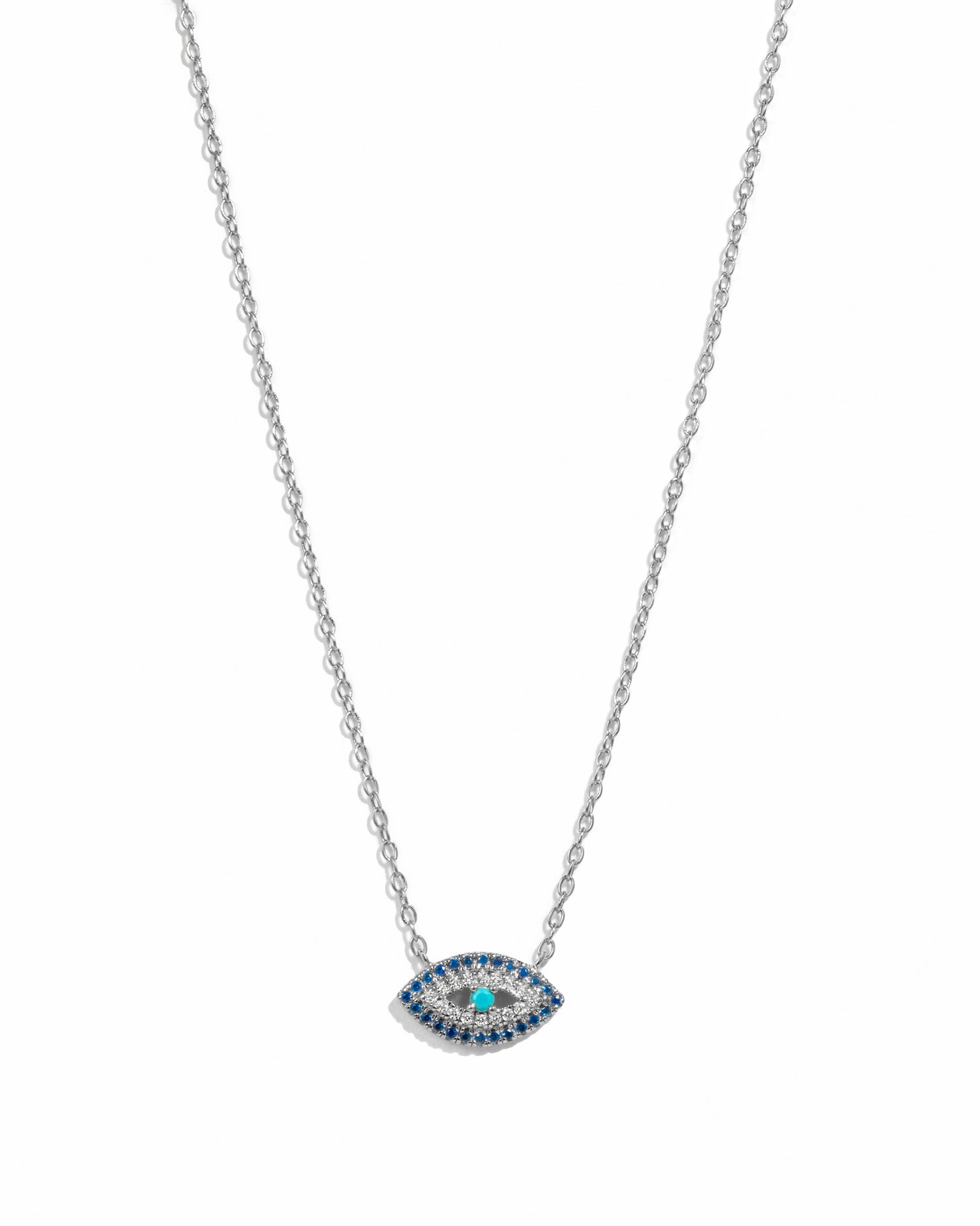 Sterling silver Sapphire Evil Eye Necklace with blue and white gemstone details, showcasing protective jewelry design.