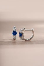 sapphire three stone huggie hoop earring sterling silver side view 
