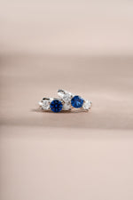 sapphire three stone huggie hoop earring  sterling silver closeup