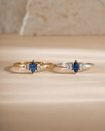 Sami Jewels sapphire marquise ring in gold and sterling silver, front view showcasing the elegant marquise-shaped blue sapphire gemstone.