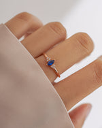 Sami Jewels Sapphire Marquise Ring in rose gold featuring a marquise-cut blue sapphire gemstone and elegant band design.