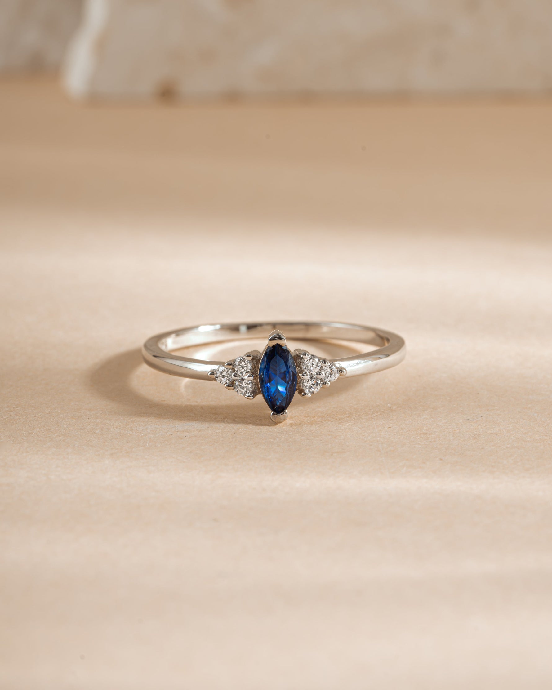 Sterling silver Sapphire Marquise Ring by Sami Jewels featuring a prominent marquise-cut sapphire gemstone.
