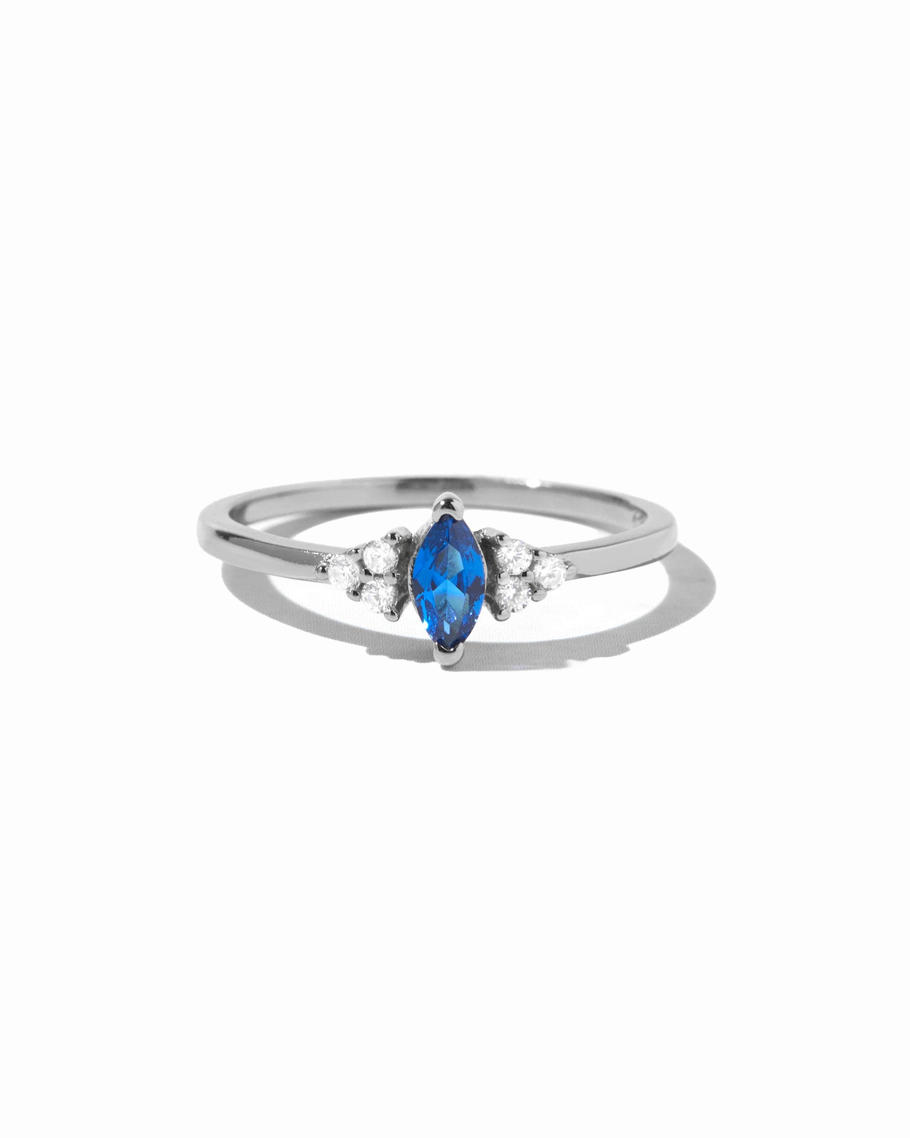 Sami Jewels sapphire marquise ring featuring a sterling silver band and a prominent marquise-cut blue sapphire gemstone.