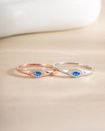 Sapphire Evil Eye Ring in rose gold and sterling silver, featuring a detailed sapphire eye design, from Sami Jewels.
