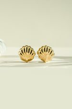 Gold stainless steel SS Shell Earrings by Sami Jewels, front view showcasing sleek shell design and water-resistant finish.