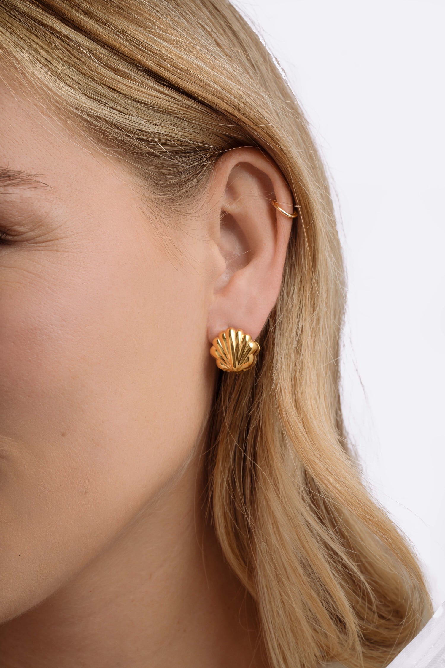 Gold stainless steel SS Shell Earrings by Sami Jewels featuring a stylish shell design for a chic, water-resistant look.