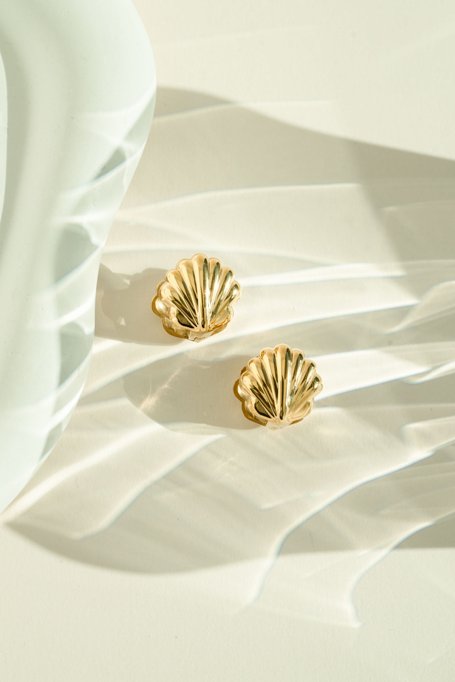 Gold stainless steel SS Shell Earrings by Sami Jewels, featuring a stylish shell design, waterproof and perfect for everyday wear.