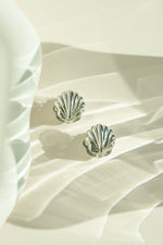 Silver stainless steel SS Shell earrings by Sami Jewels featuring a sleek, waterproof design with a shell motif.