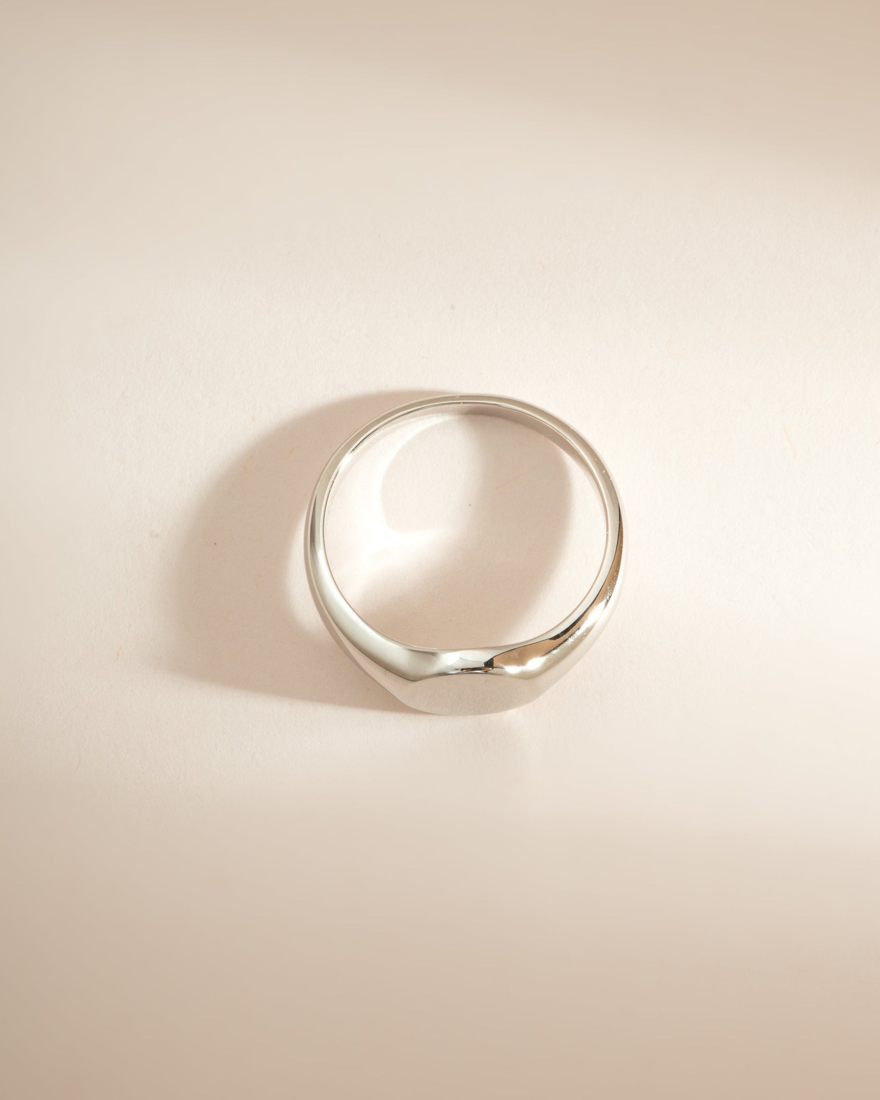 Sterling silver Signet Ring from Sami Jewels, top view showing smooth, polished surface and classic design.