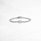 Silver Bezeled Emerald-Cut Charm Tennis Bracelet on white background by Sami Jewels