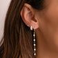 Silver CZ Diamond Earrings dangling earrings and silver pave hoops on models ear