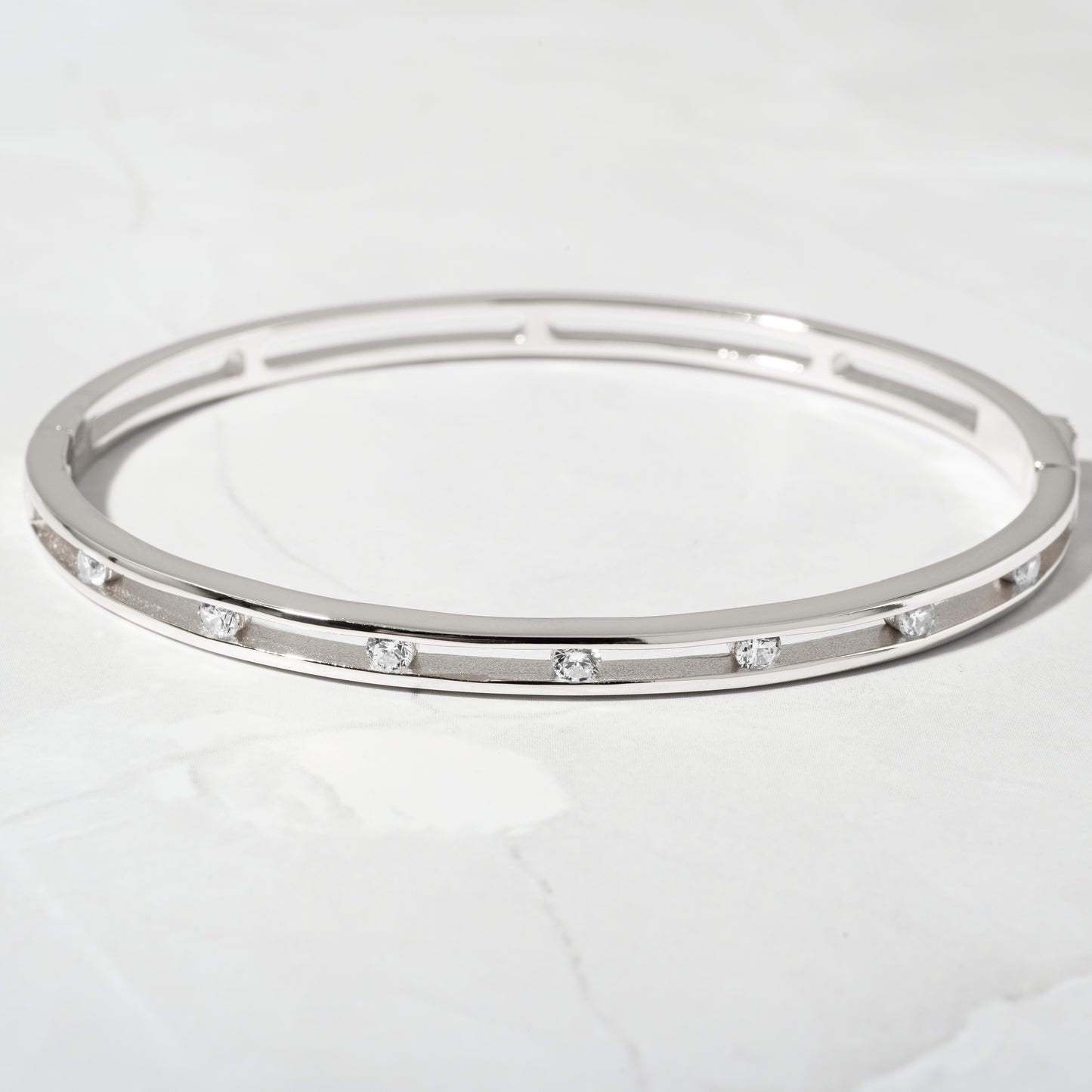 close up of a sterling silver bangle bracelet