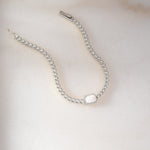 Silver Opal Baguette Tennis Bracelet by Sami Jewels featuring sparkling silver and opal baguette stones on a delicate bracelet.