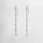 Silver Elegant Zircon Pendant Drop Earrings on white background