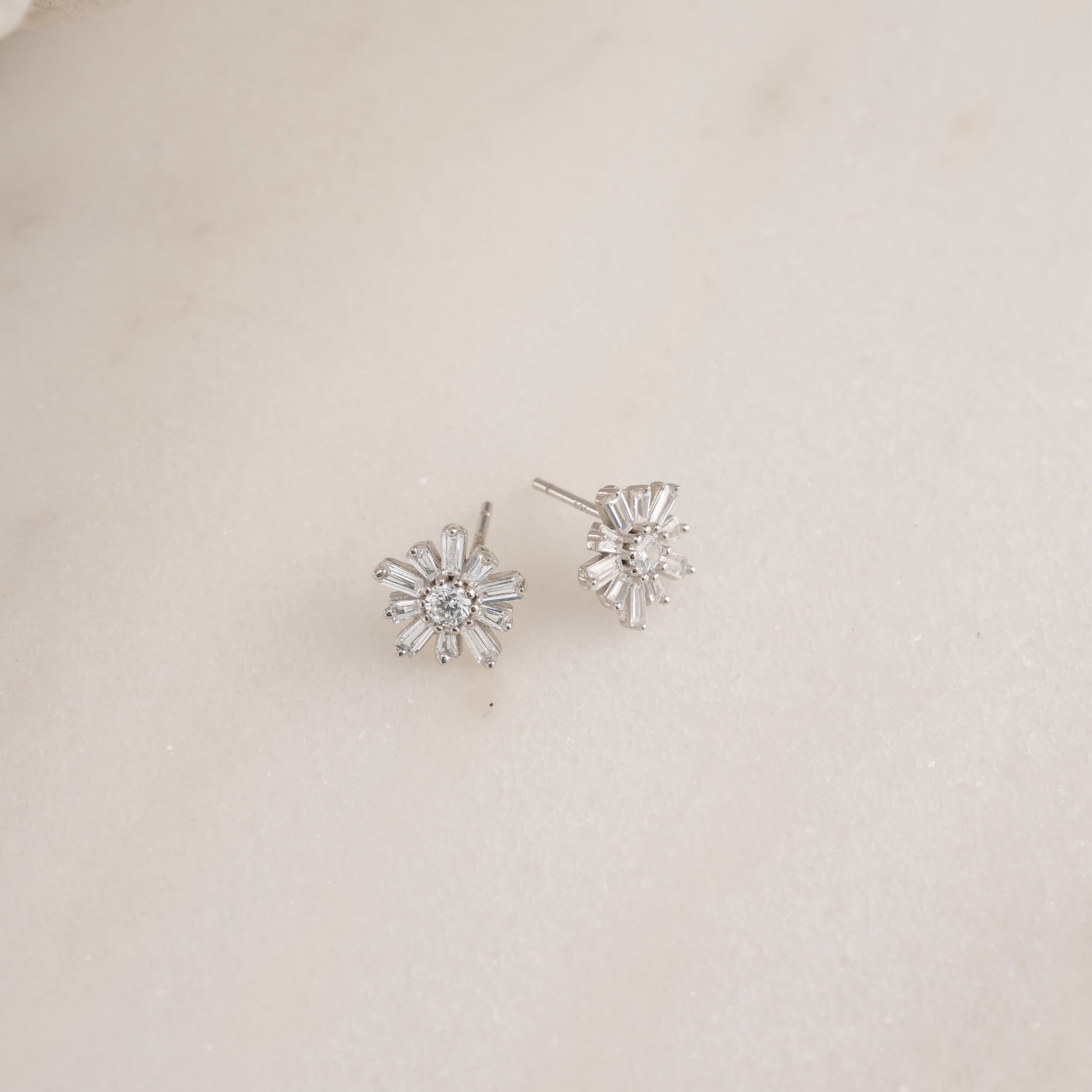 silver bridal earrings with a flower design