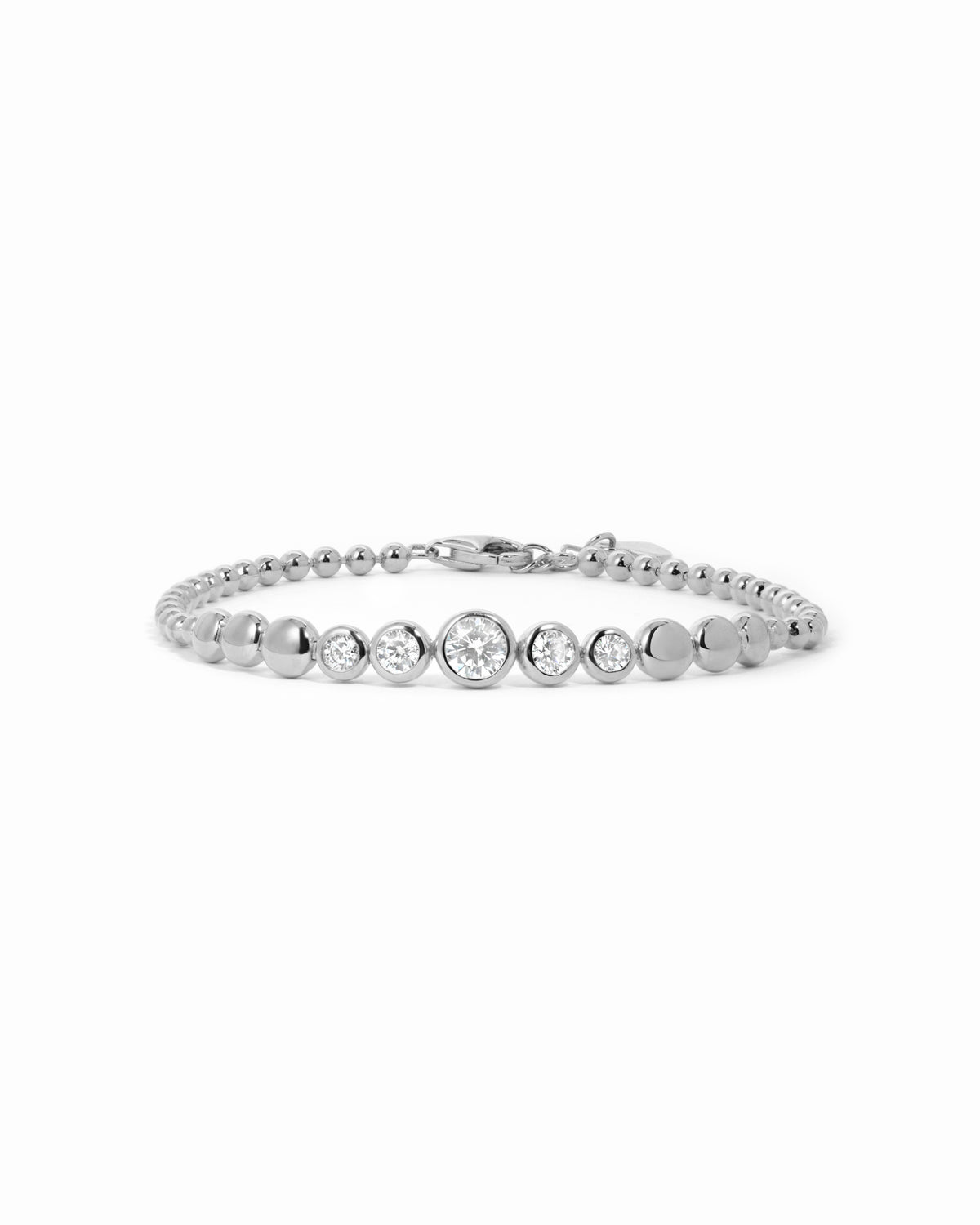 Silver graduated bezel tennis bracelet with clear cubic zirconia on a white background.