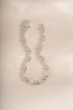 Silver bracelet with marquise and round cut diamond stones, Sami Jewels tennis bracelet displayed flat.
