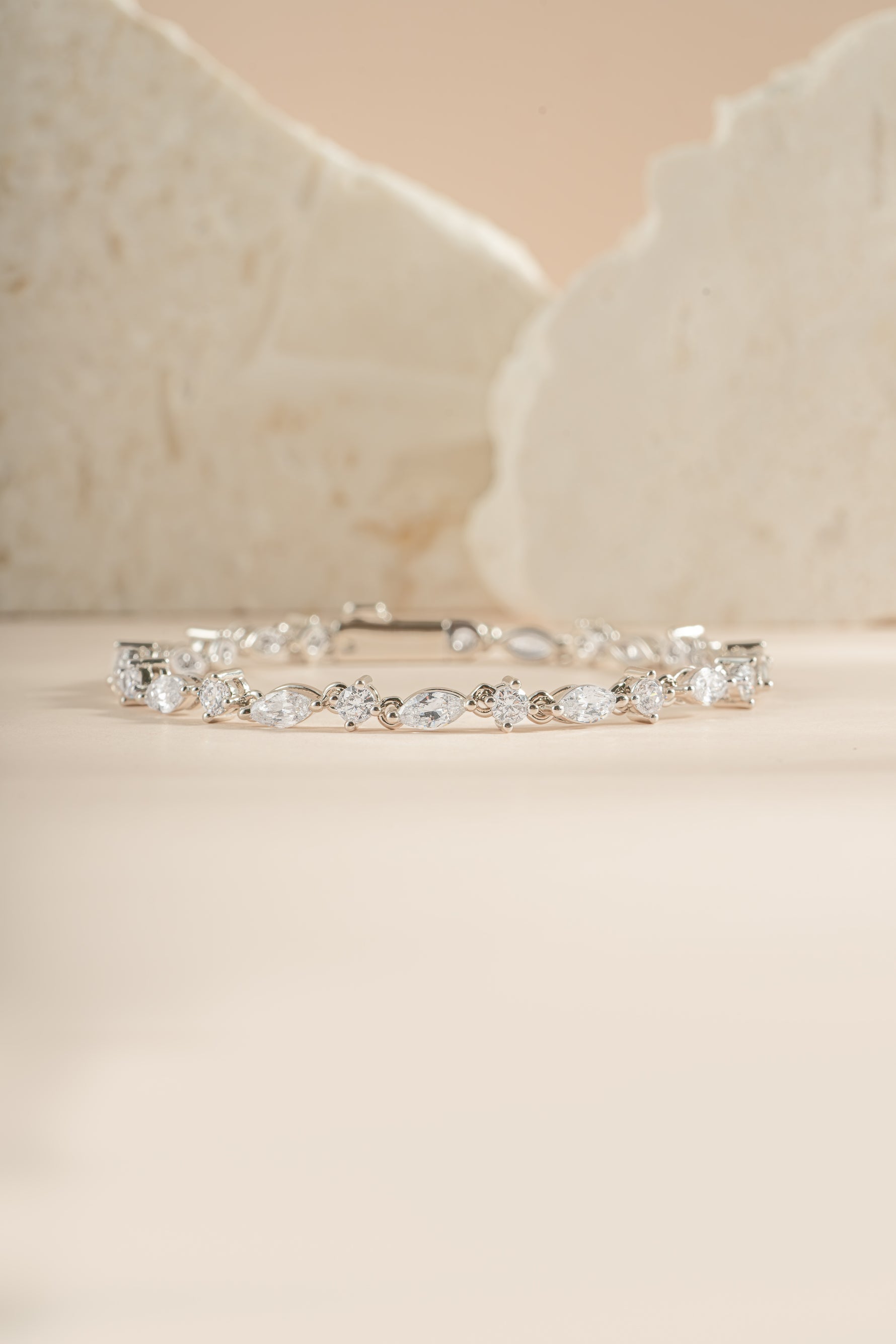 Silver Marquise and Round Stone Diamond Bracelet from Sami Jewels featuring a sleek tennis bracelet design.