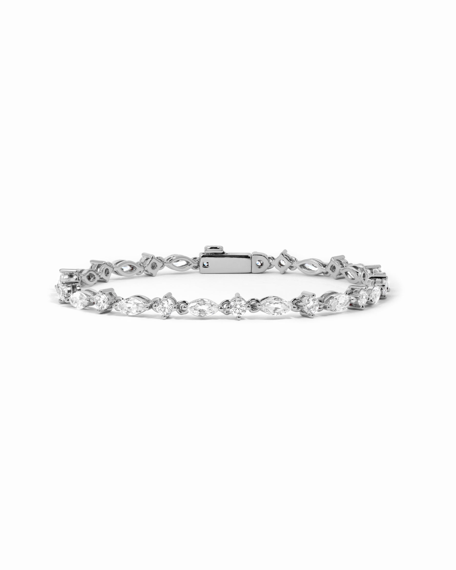 Silver diamond bracelet with marquise and round stones, featuring a tennis bracelet design by Sami Jewels.