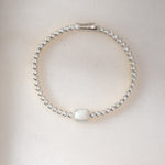 Silver Opal Baguette Tennis Bracelet by Sami Jewels featuring sleek silver design and sparkling opal baguette stones.