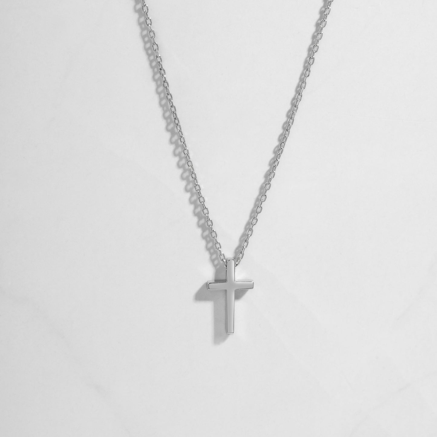 Sterling silver plain cross necklace for her, cross necklace for women on white background