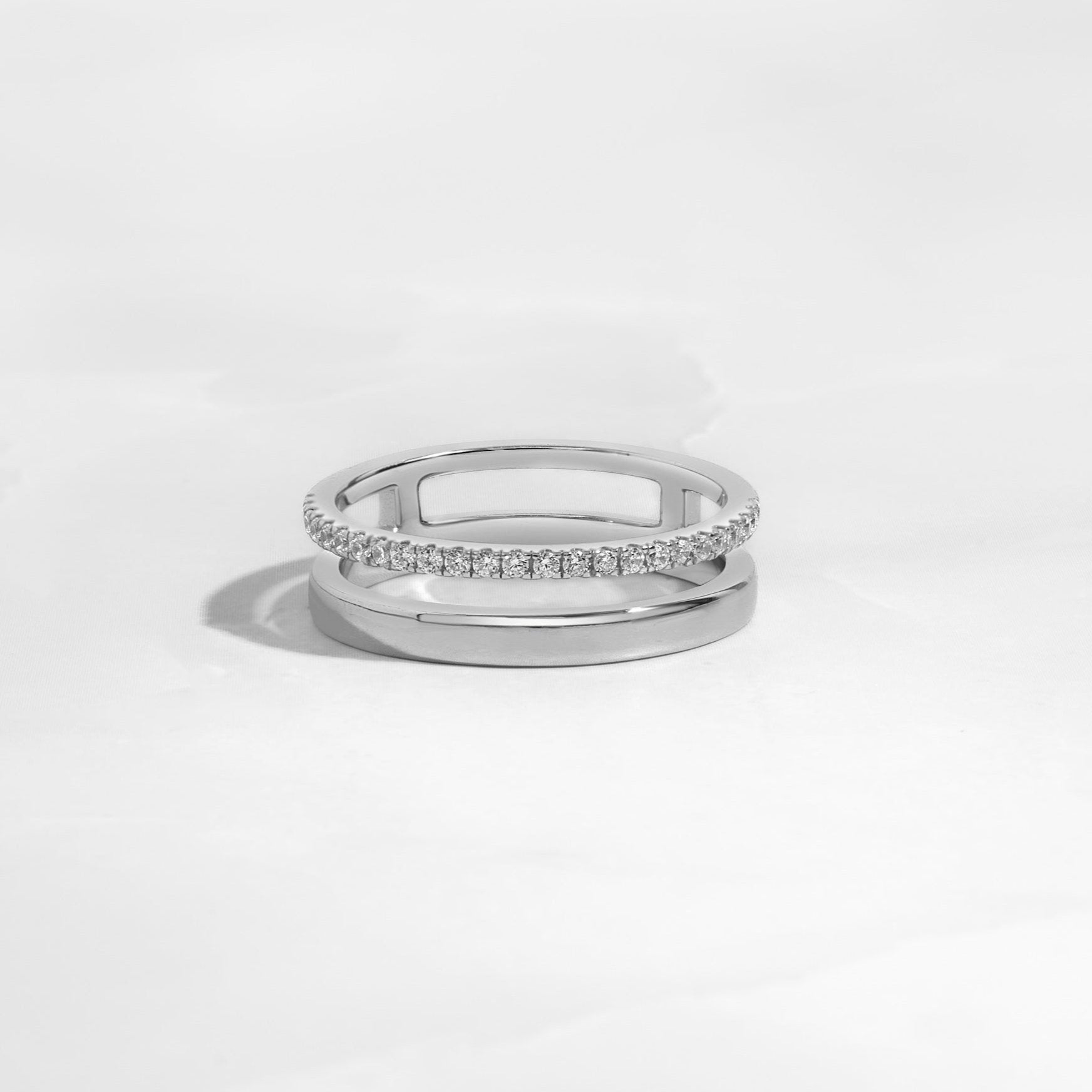 Sterling silver stacking ring double row band on white background