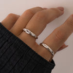 Sterling silver star setting diamond rings on model
