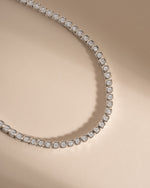 Silver Square Tennis Necklace by Sami Jewels featuring CZ bezel-set cushion-shaped pendants on a sleek chain.