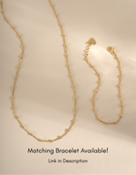 Gold beaded necklace and matching chain bracelet from Sami Jewels, featuring simple, elegant beaded jewelry design.