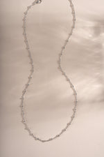 Sterling silver simple beaded necklace by Sami Jewels featuring small round beads on a delicate chain.