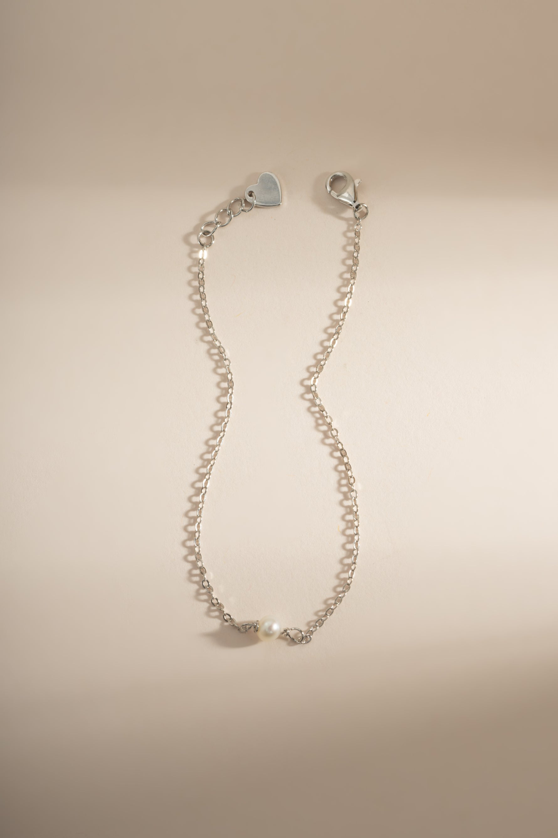 Freshwater pearl bracelet by Sami Jewels featuring sterling silver lobster clasp closure and elegant, simple design.