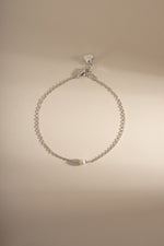 Sterling silver bracelet with elegant freshwater pearl accents, designed by Sami Jewels for a simple, sophisticated look.